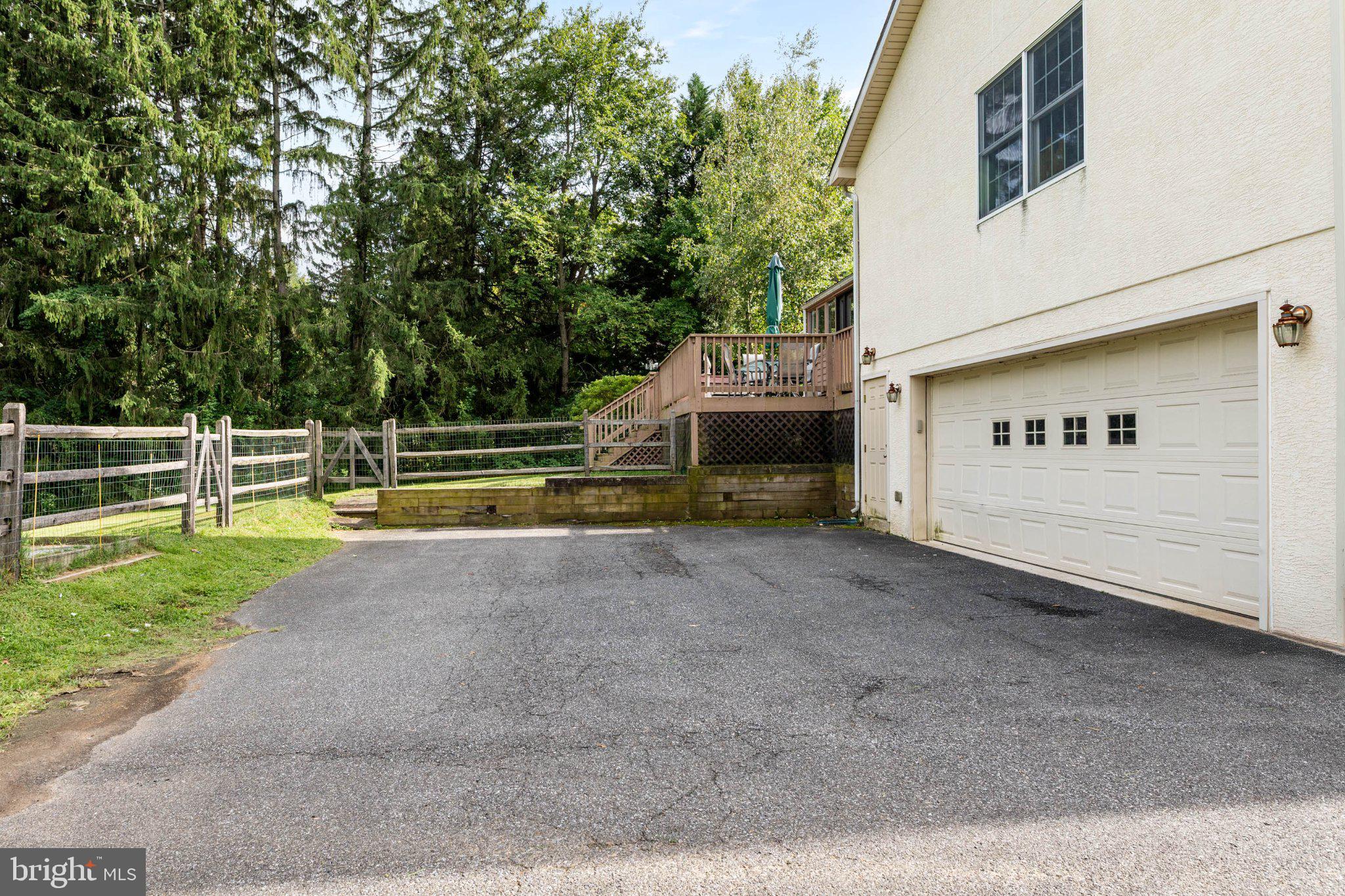 211 Fairview Road Penn Valley, PA 19072 - Photo 49 of 58 Back entry large 2-car garage with storage