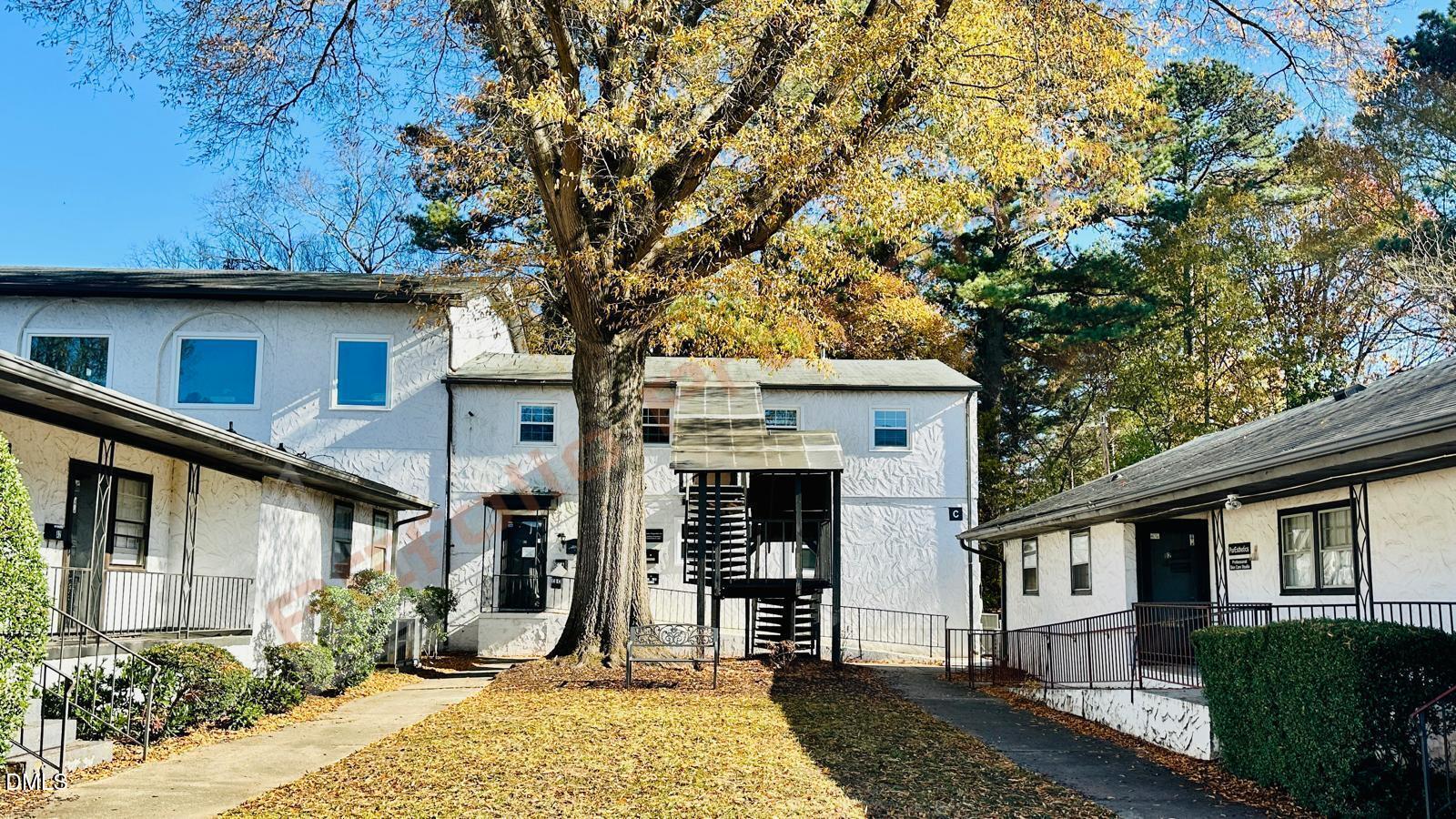 901 Kildaire Farm Road, Unit D1 Cary, NC 27511 - Photo 2 of 13 a front view of a house with garden