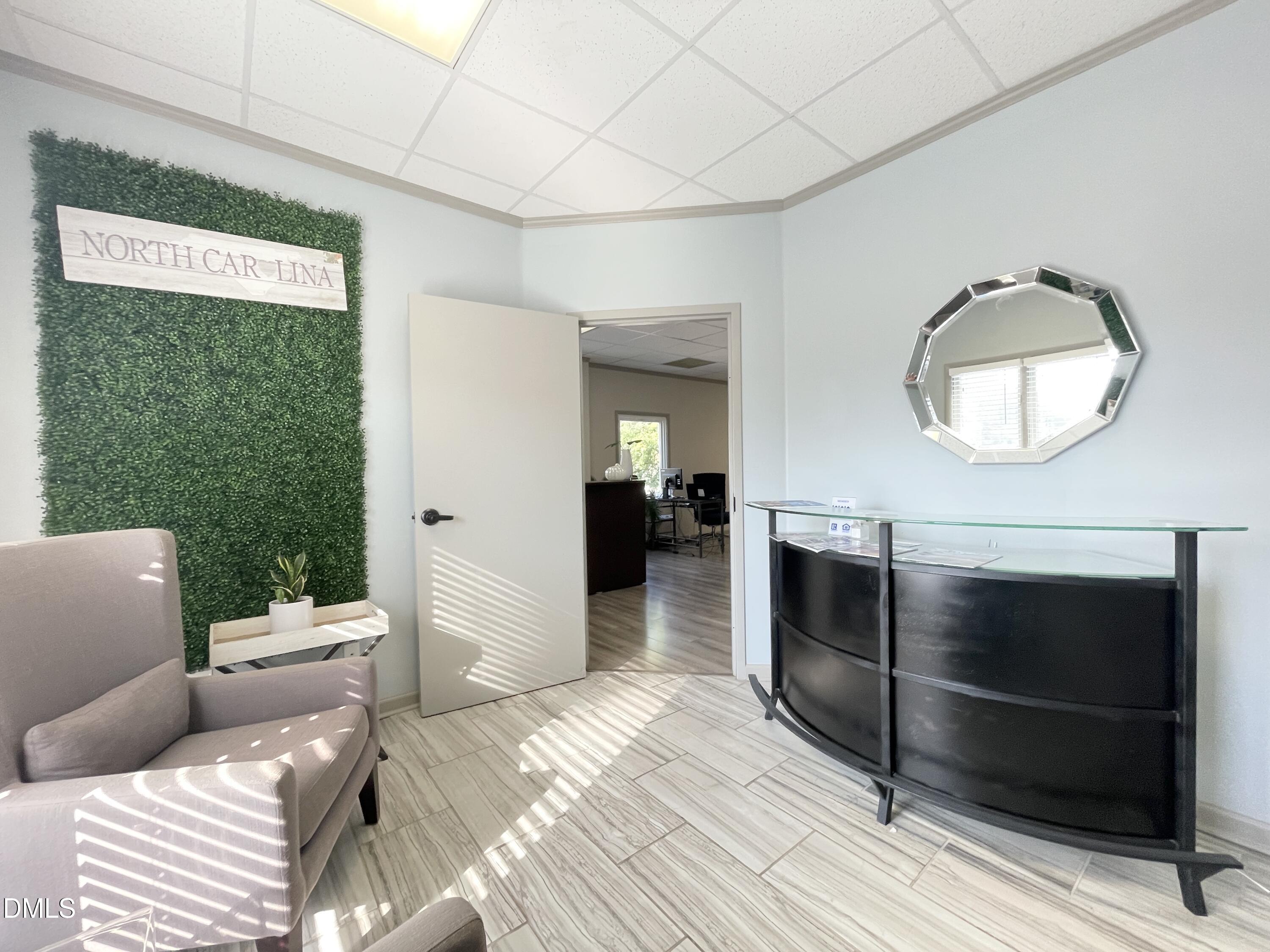 901 Kildaire Farm Road, Unit D1 Cary, NC 27511 - Photo 5 of 13 a living room with furniture