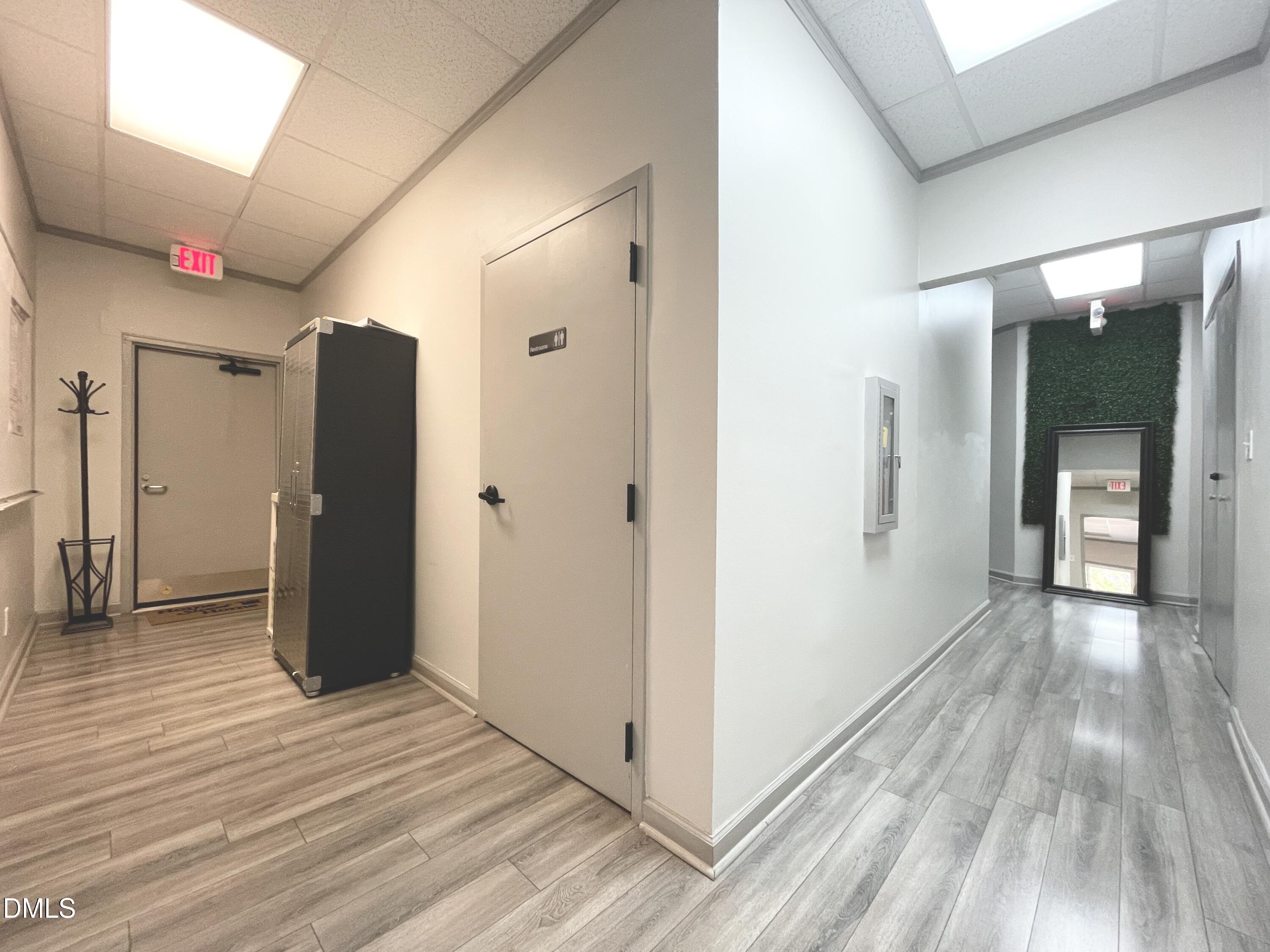 901 Kildaire Farm Road, Unit D1 Cary, NC 27511 - Photo 8 of 13 a view of hallway with wooden floor