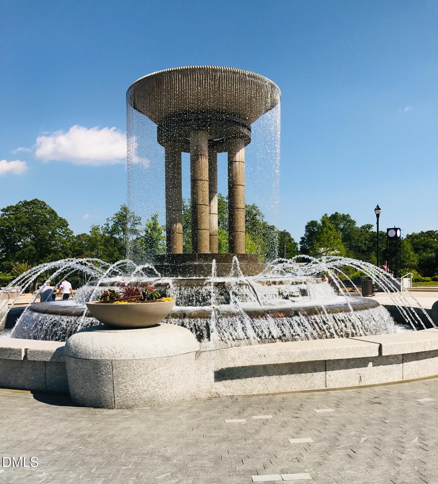 901 Kildaire Farm Road, Unit D1 Cary, NC 27511 - Photo 10 of 13 a view of parking with cars parked