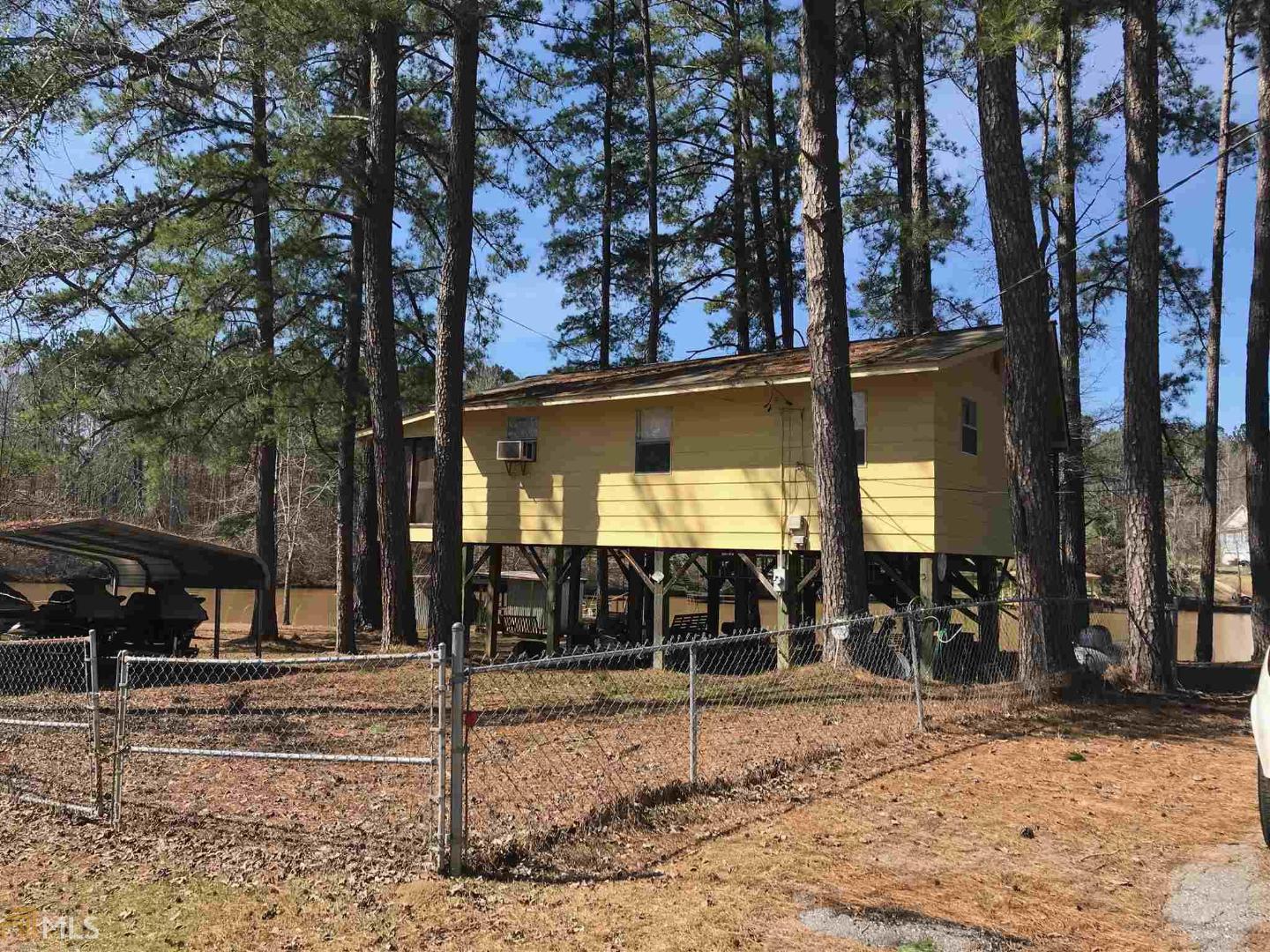 a view of a building with trees