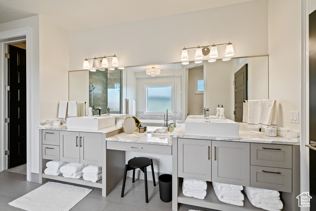 6026 Zen Trail Way St. George, UT 84790 - Photo 14 of 41 Bathroom featuring a stall shower, tile patterned floors, and vanity