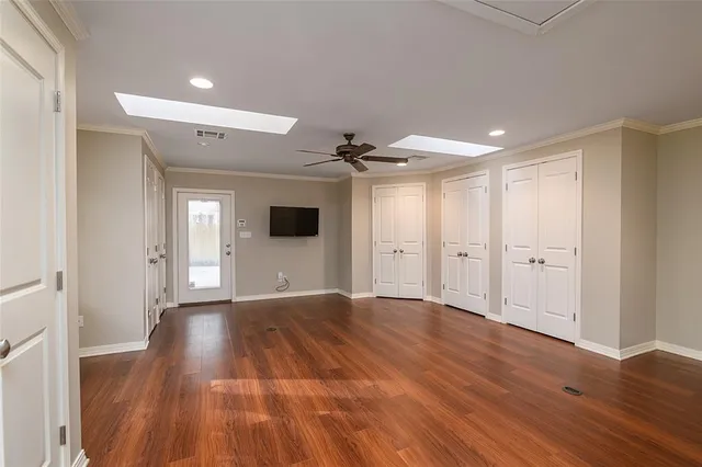 a bathroom with a sink double vanity and a mirror