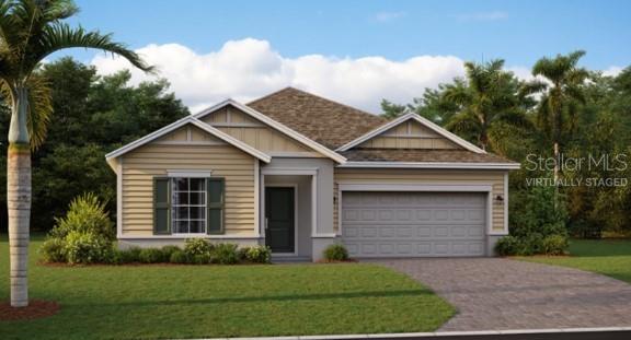 4630 Ackee Road Kissimmee, FL 34758 - Photo 1 of 1 a front view of a house with a yard