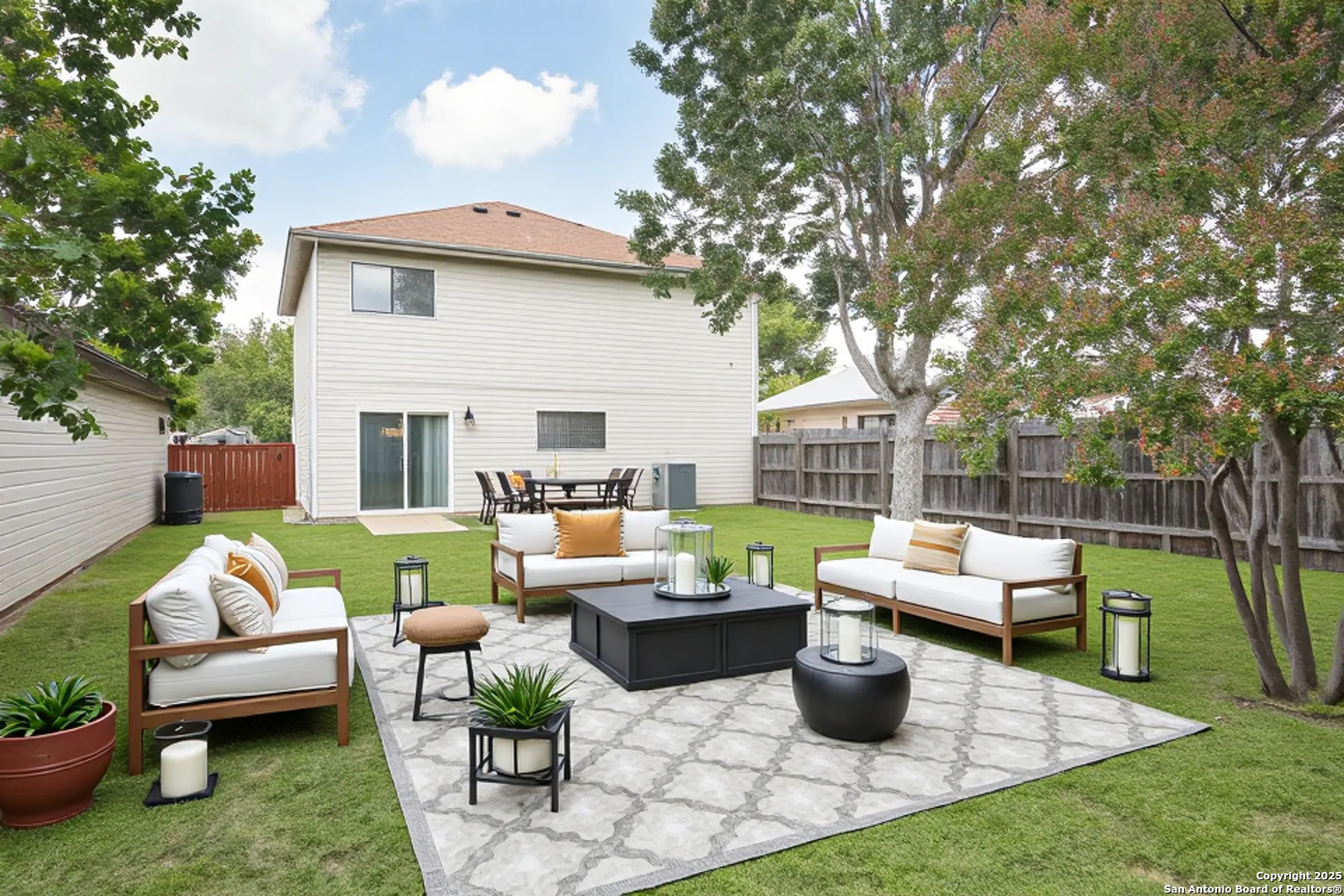 5510 Camry Spring San Antonio, TX 78251 - Photo 33 of 37 a view of a patio with couches chairs and a fire pit