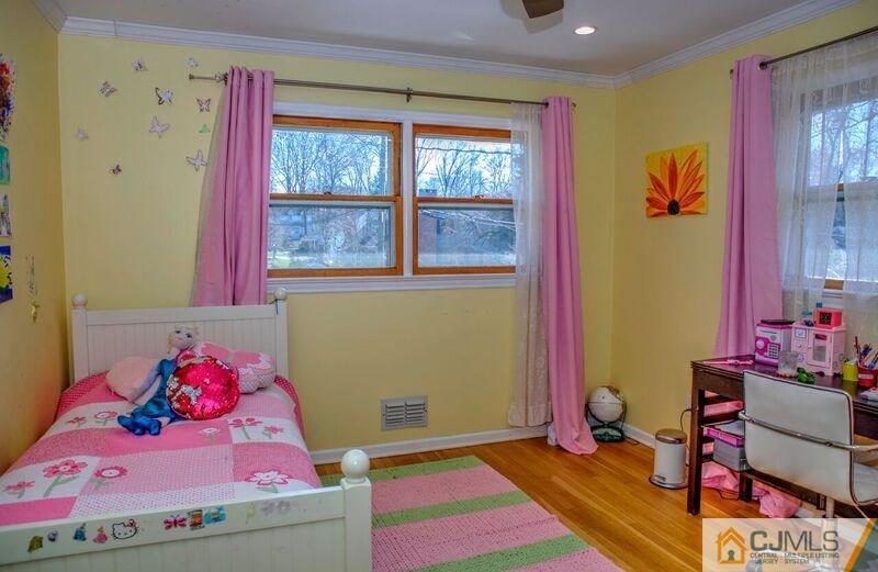36 Edgewood Road Edison, NJ 08820 - Photo 17 of 23 a bedroom with a bed and window