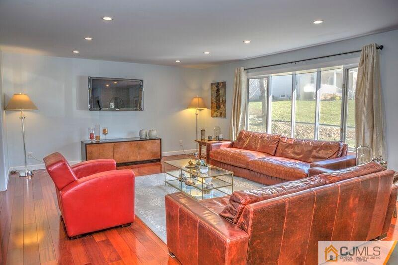 36 Edgewood Road Edison, NJ 08820 - Photo 3 of 23 a living room with furniture and a large window