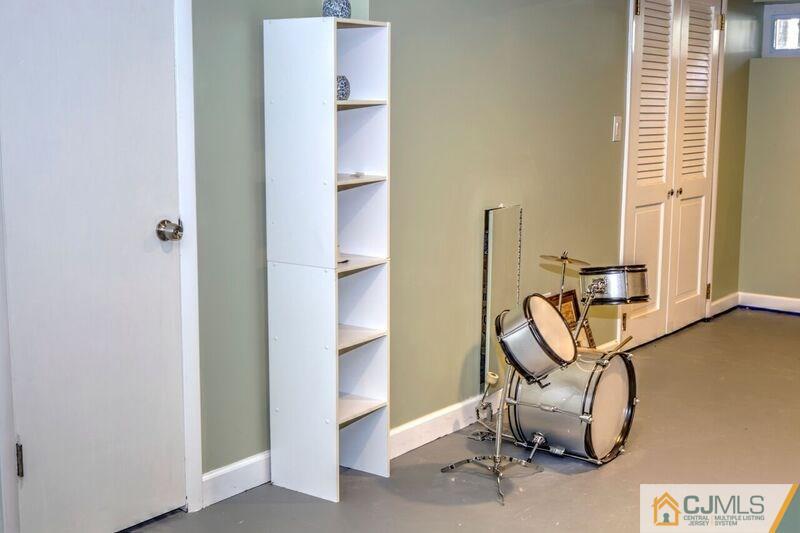 36 Edgewood Road Edison, NJ 08820 - Photo 22 of 23 a view of a room with gym equipment
