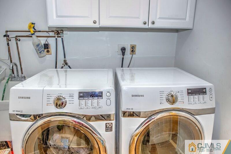 36 Edgewood Road Edison, NJ 08820 - Photo 23 of 23 a utility room with dryer and washer