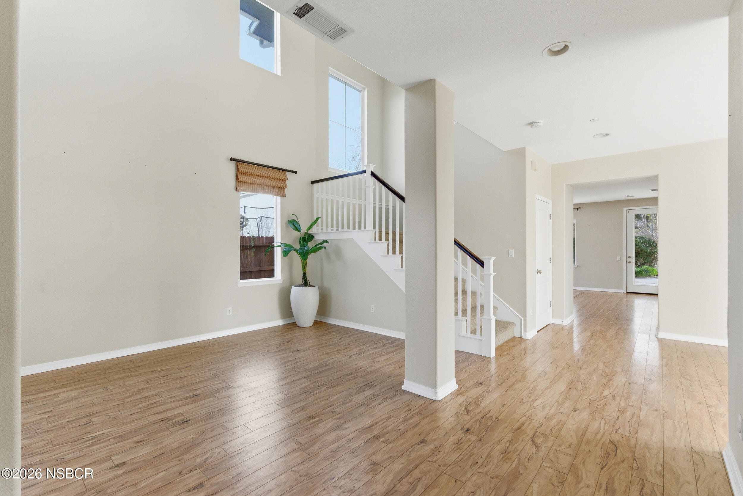 5632 Menemsha Lane Santa Maria, CA 93455 - Photo 22 of 66 a view of an entryway with wooden floor
