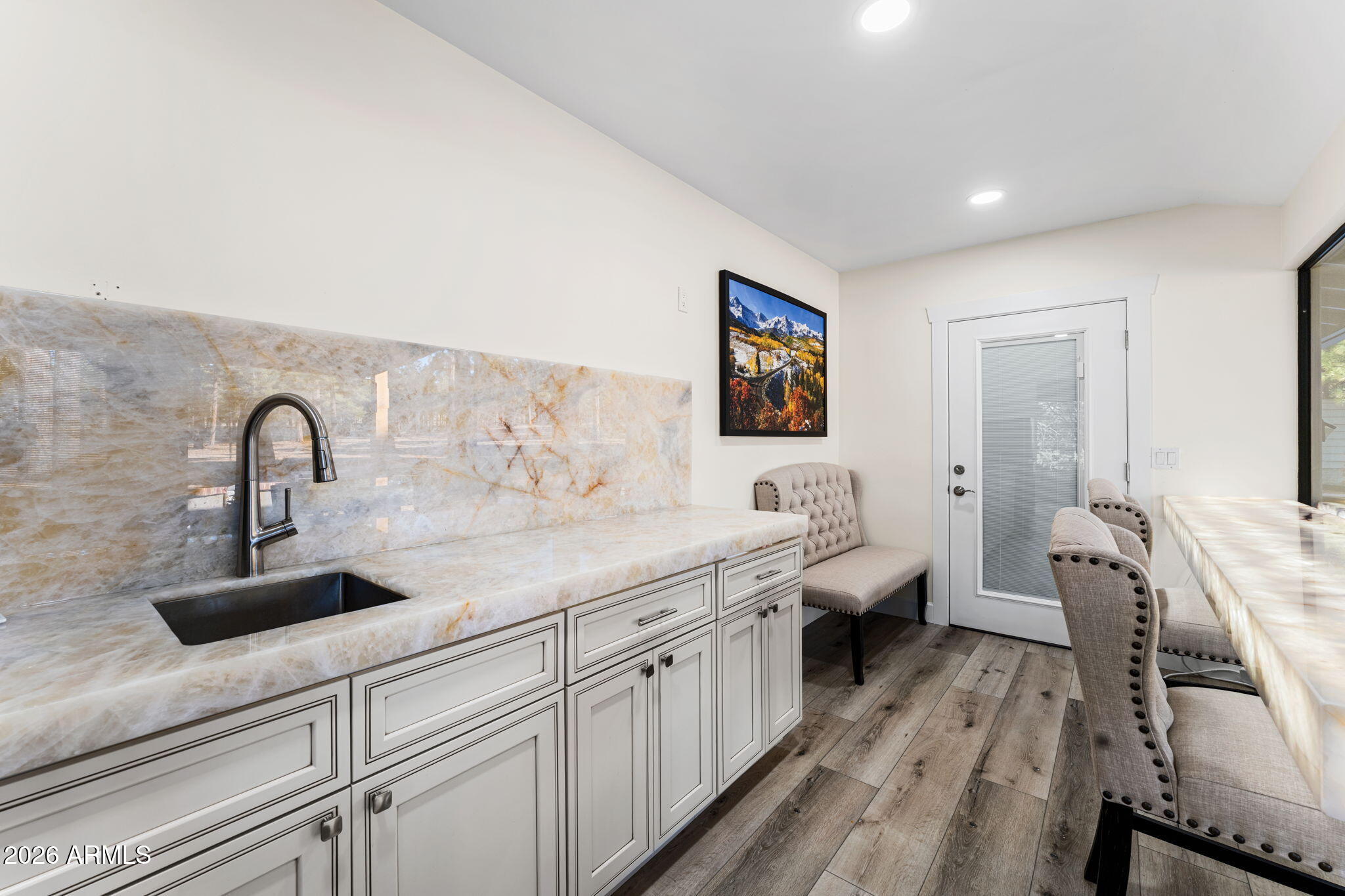 5055 Townsend-Winona Road Flagstaff, AZ 86004 - Photo 25 of 34 a spacious bathroom with a double vanity sink a mirror and a shower