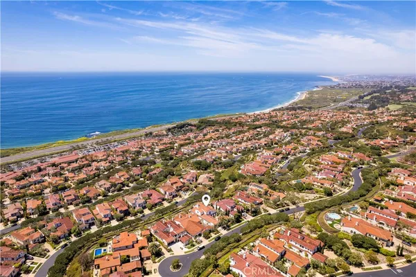 an aerial view of beach and ocean