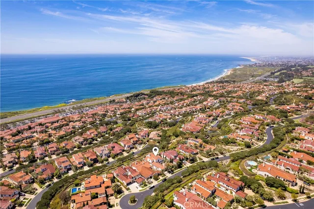 an aerial view of beach and ocean
