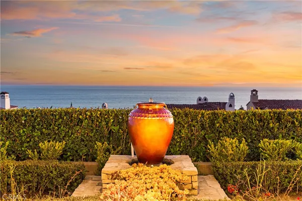 a view of a chairs and table in patio