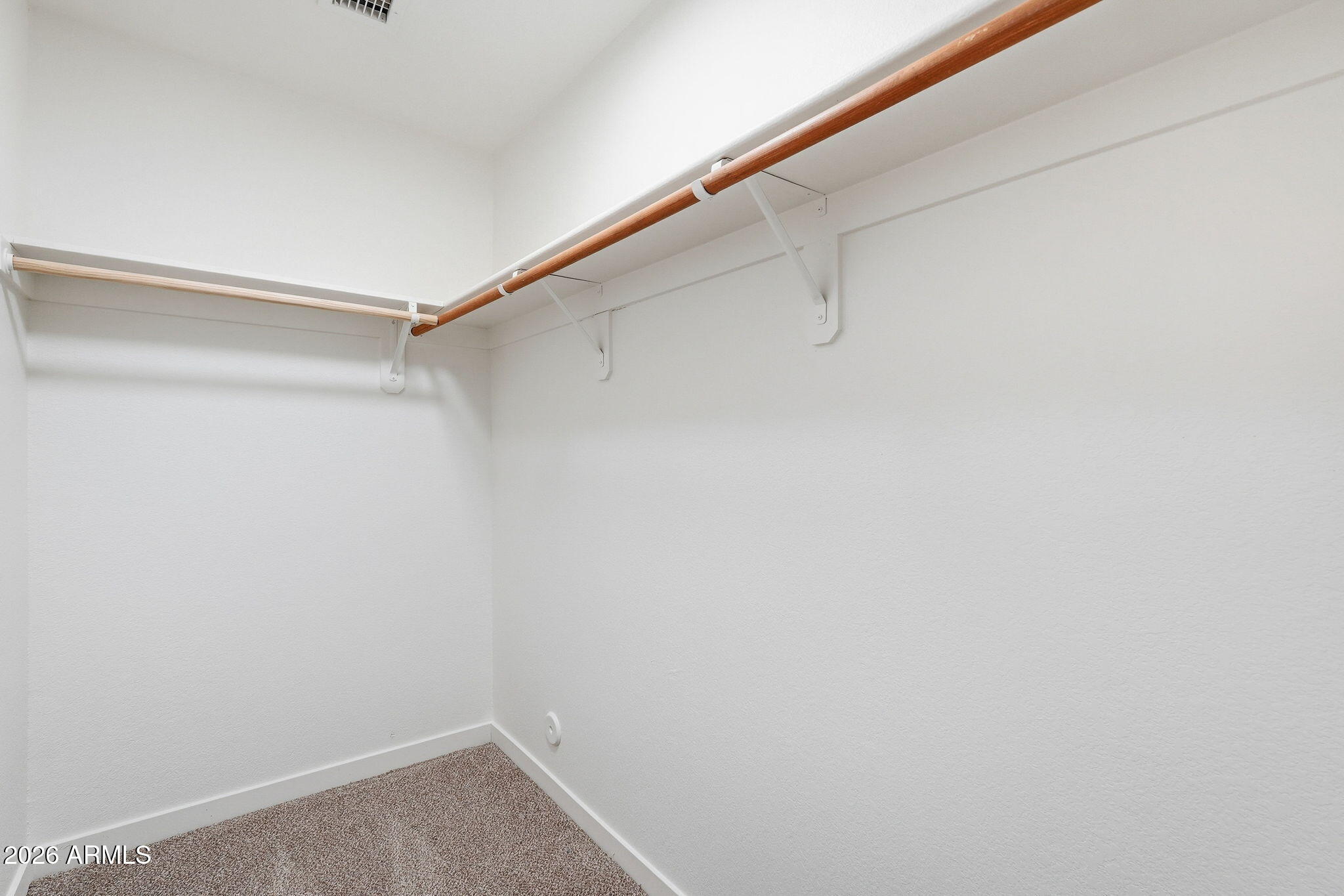 6126 East Roland Street Mesa, AZ 85215 - Photo 19 of 35 Primary Walkin Closet