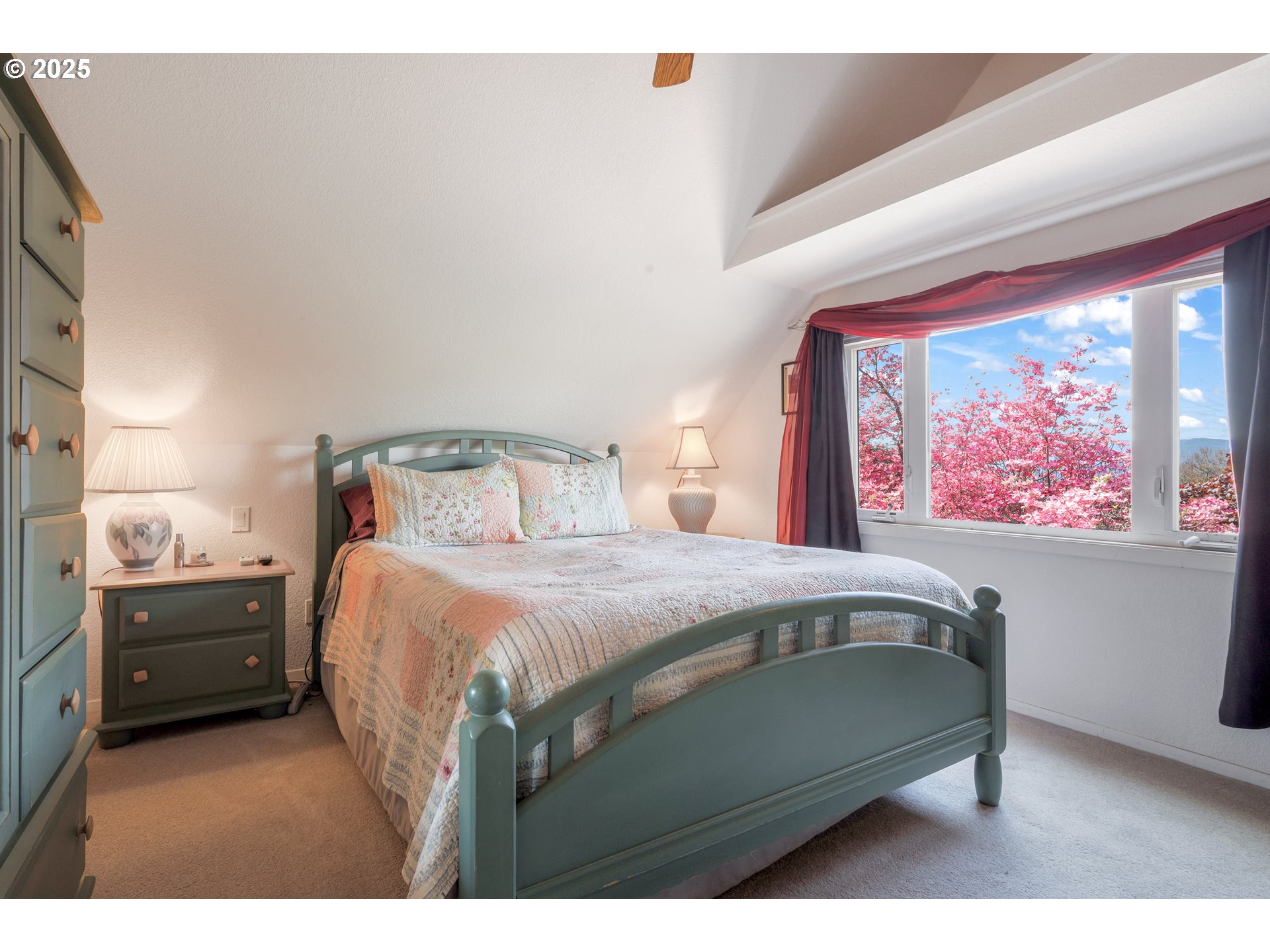 48025 Northwest Strohmayer Road Forest Grove, OR 97116 - Photo 22 of 30 a bedroom with a bed and a painting on the wall