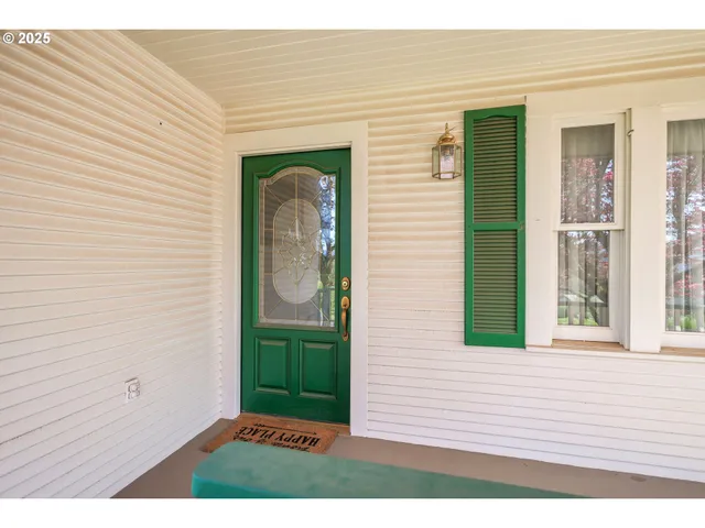 a view of backyard with front door