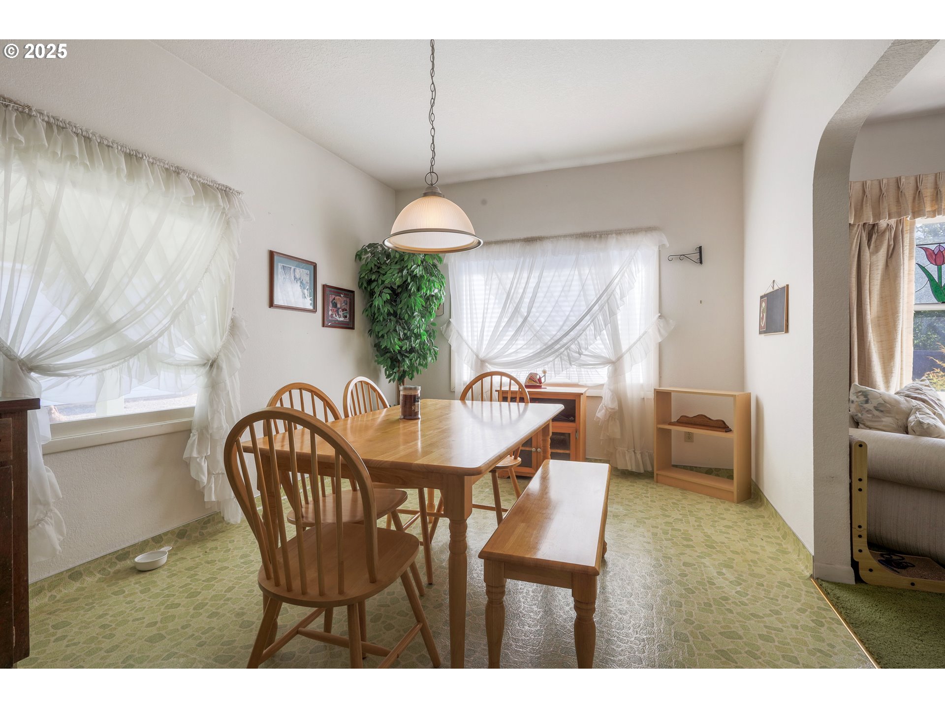 48025 Northwest Strohmayer Road Forest Grove, OR 97116 - Photo 8 of 30 a view of a dining room with furniture and a chandelier