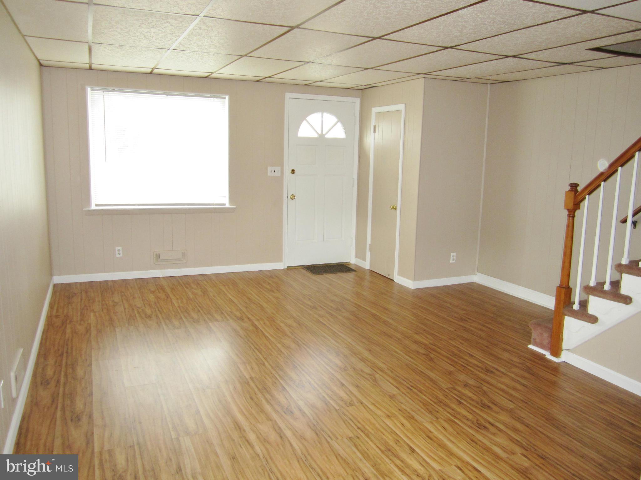 1885 Church Road Dundalk, MD 21222 - Photo 2 of 20 a view of empty room with wooden floor