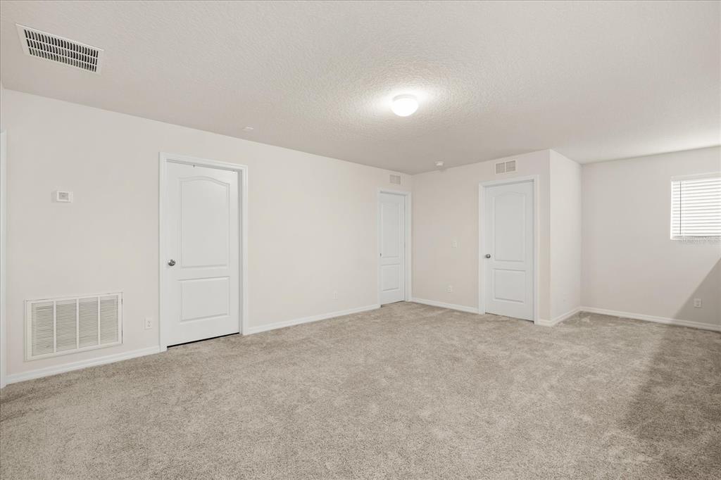 5192 Chickadee Street St. Cloud, FL 34771 - Photo 18 of 35 a view of an empty room