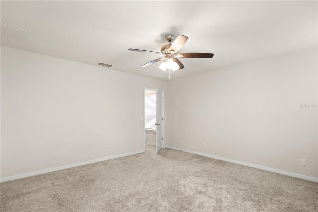 5192 Chickadee Street St. Cloud, FL 34771 - Photo 19 of 35 a view of an empty room