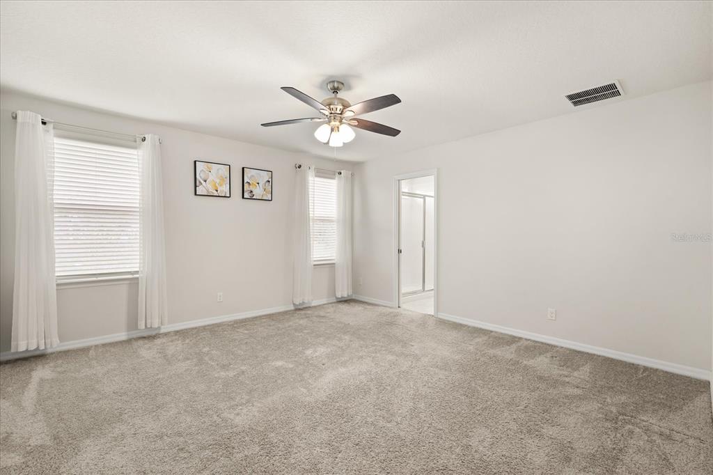 5192 Chickadee Street St. Cloud, FL 34771 - Photo 21 of 35 a view of an empty room with a window