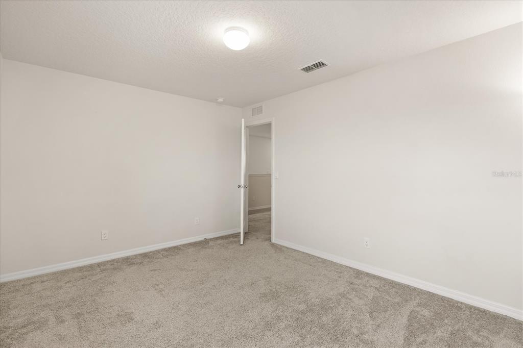 5192 Chickadee Street St. Cloud, FL 34771 - Photo 24 of 35 a view of an empty room