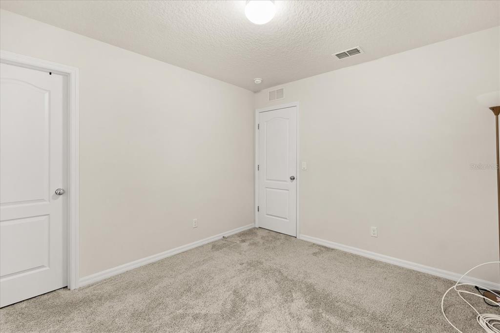 5192 Chickadee Street St. Cloud, FL 34771 - Photo 27 of 35 a view of an empty room