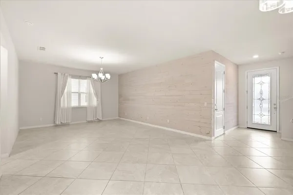 an empty room with a bathroom