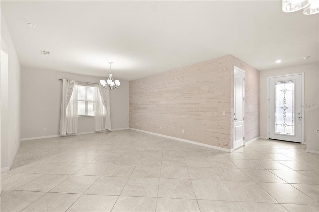 5192 Chickadee Street St. Cloud, FL 34771 - Photo 3 of 35 an empty room with a bathroom