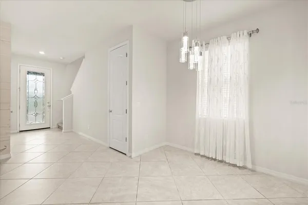 a view of a bathroom with a shower and a sink