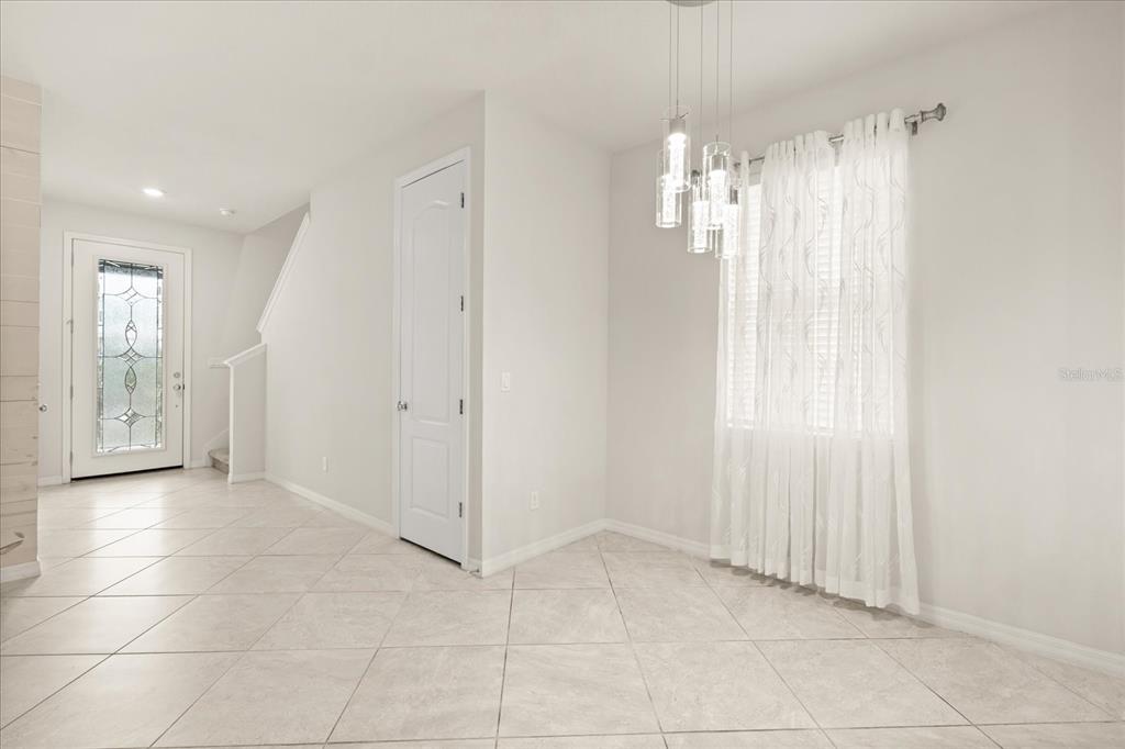 5192 Chickadee Street St. Cloud, FL 34771 - Photo 4 of 35 a view of a bathroom with a shower and a sink