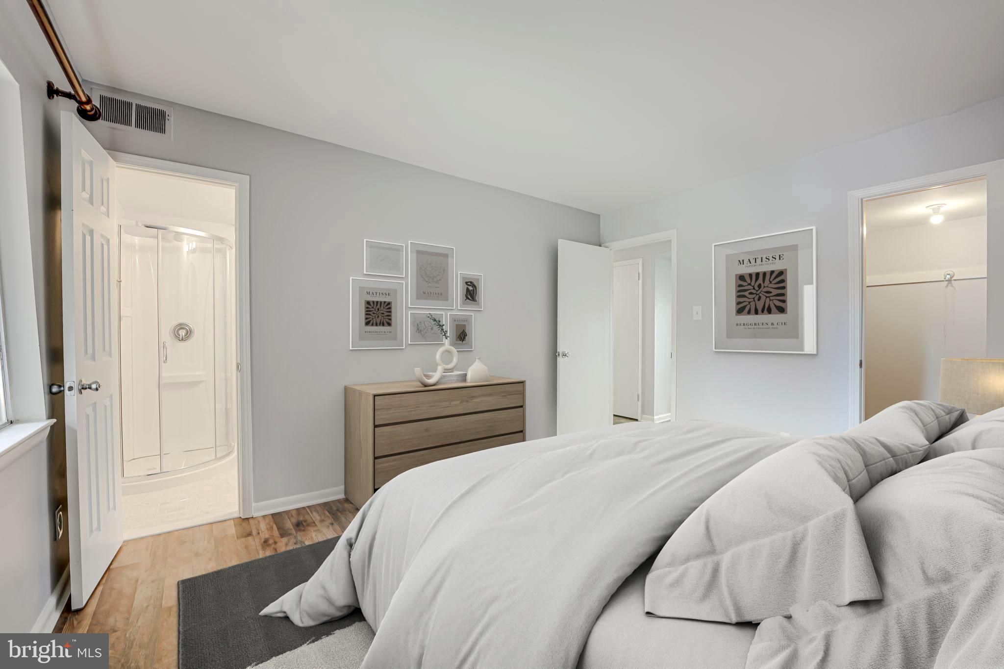 11601 Vantage Hill Road, Unit 22B Reston, VA 20190 - Photo 4 of 37 Virtual staging: Great look for master bedroom.