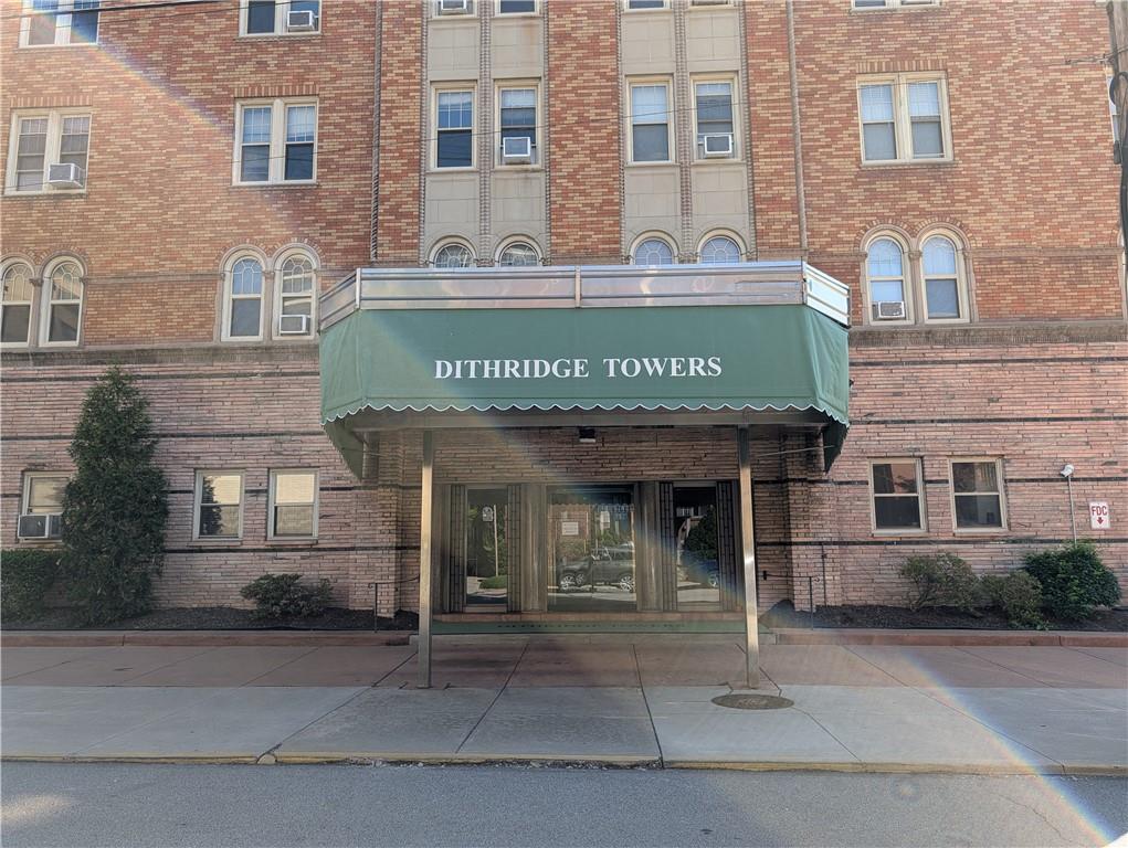 144 North Dithridge Street, Unit 403 Pittsburgh, PA 15213 - Photo 2 of 31 a view of building with a entrance gate