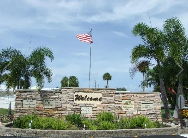 a view of a road with a building in the background