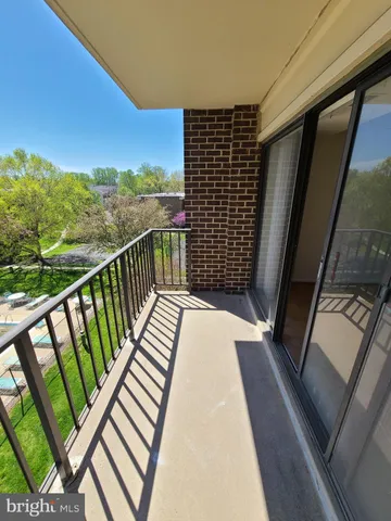 a balcony with view of city