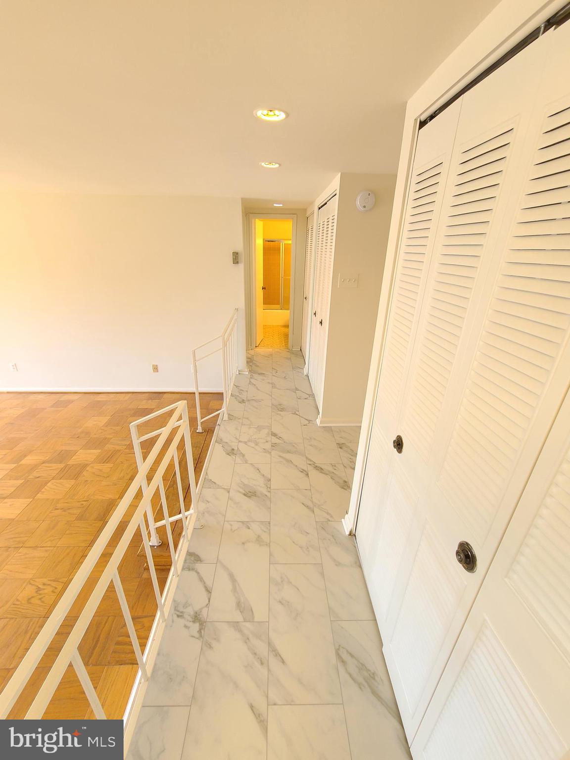9900 Georgia Avenue, Unit 310 Silver Spring, MD 20902 - Photo 5 of 16 a view of a bathroom with a tub