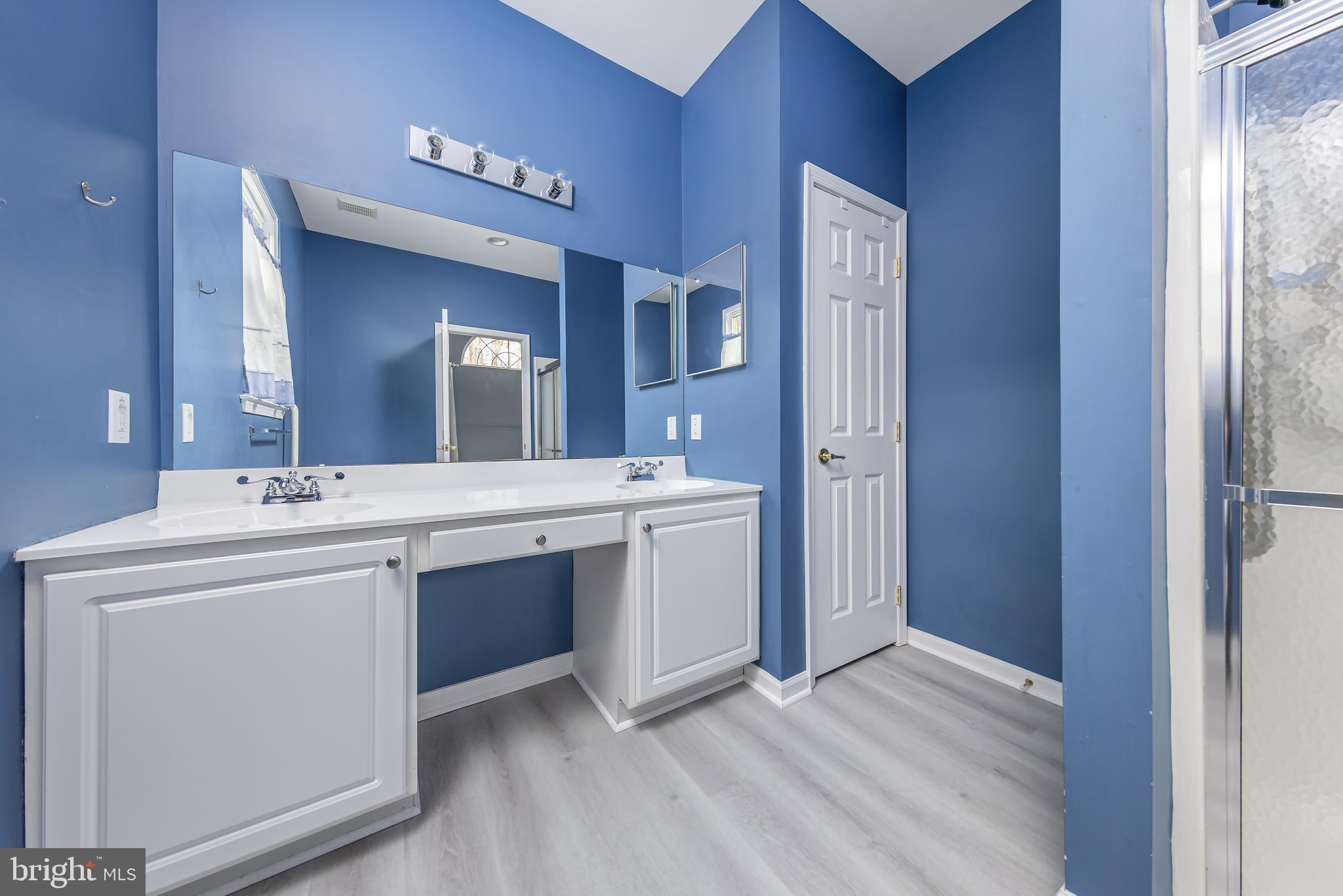 137 Merion Way Hainesport, NJ 08036 - Photo 17 of 26 a bathroom with a sink vanity and mirror