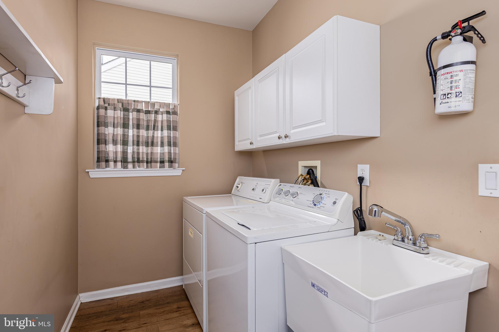 137 Merion Way Hainesport, NJ 08036 - Photo 18 of 26 a utility room with dryer and washer