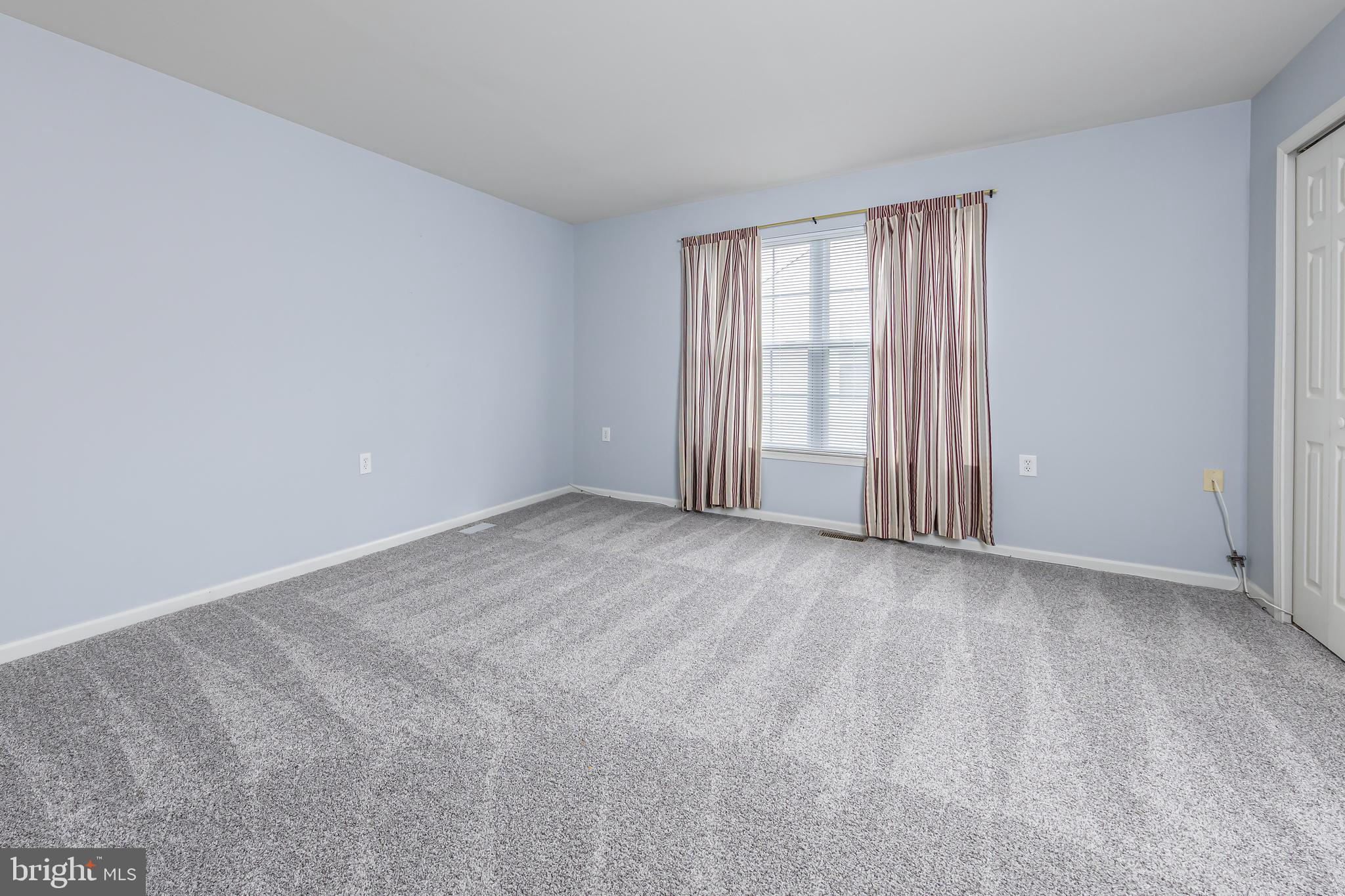 137 Merion Way Hainesport, NJ 08036 - Photo 20 of 26 a view of an empty room with a window