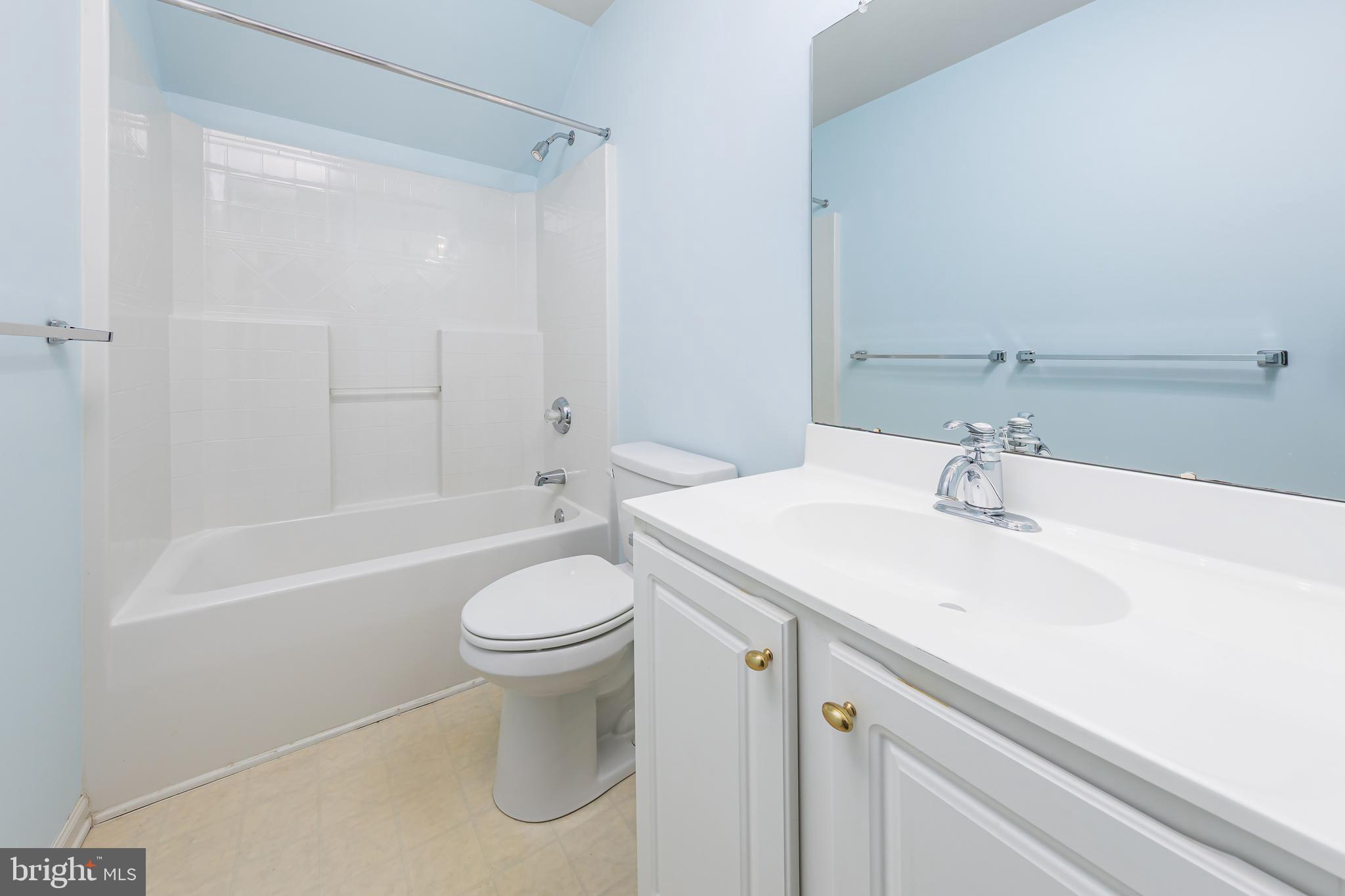 137 Merion Way Hainesport, NJ 08036 - Photo 22 of 26 a bathroom with a sink a toilet and a bathtub