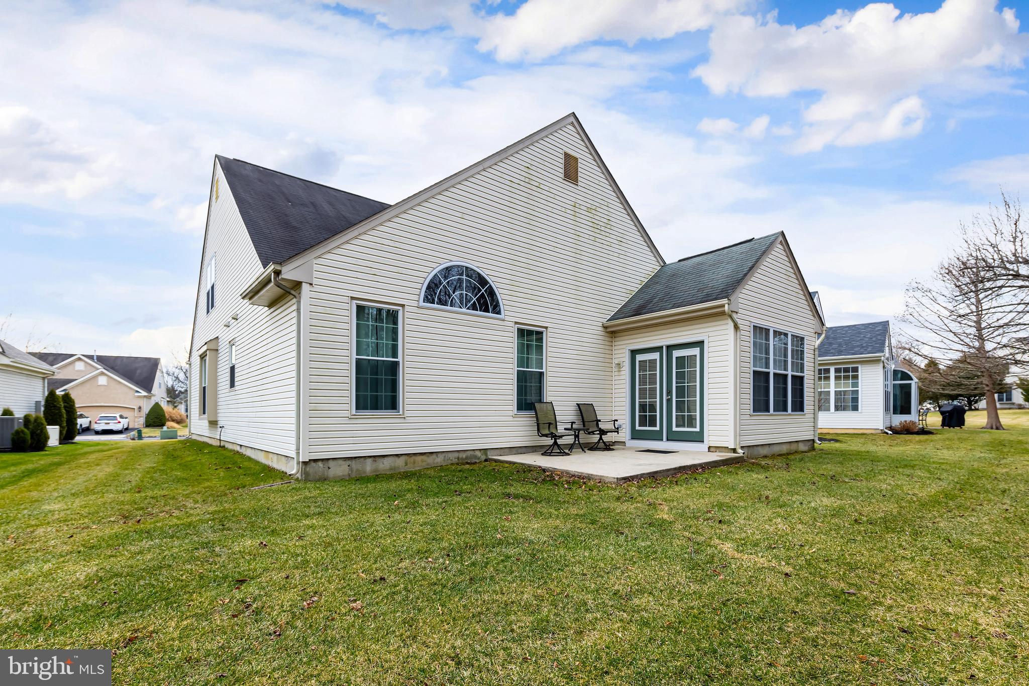 137 Merion Way Hainesport, NJ 08036 - Photo 24 of 26 a front view of house with yard and sitting area