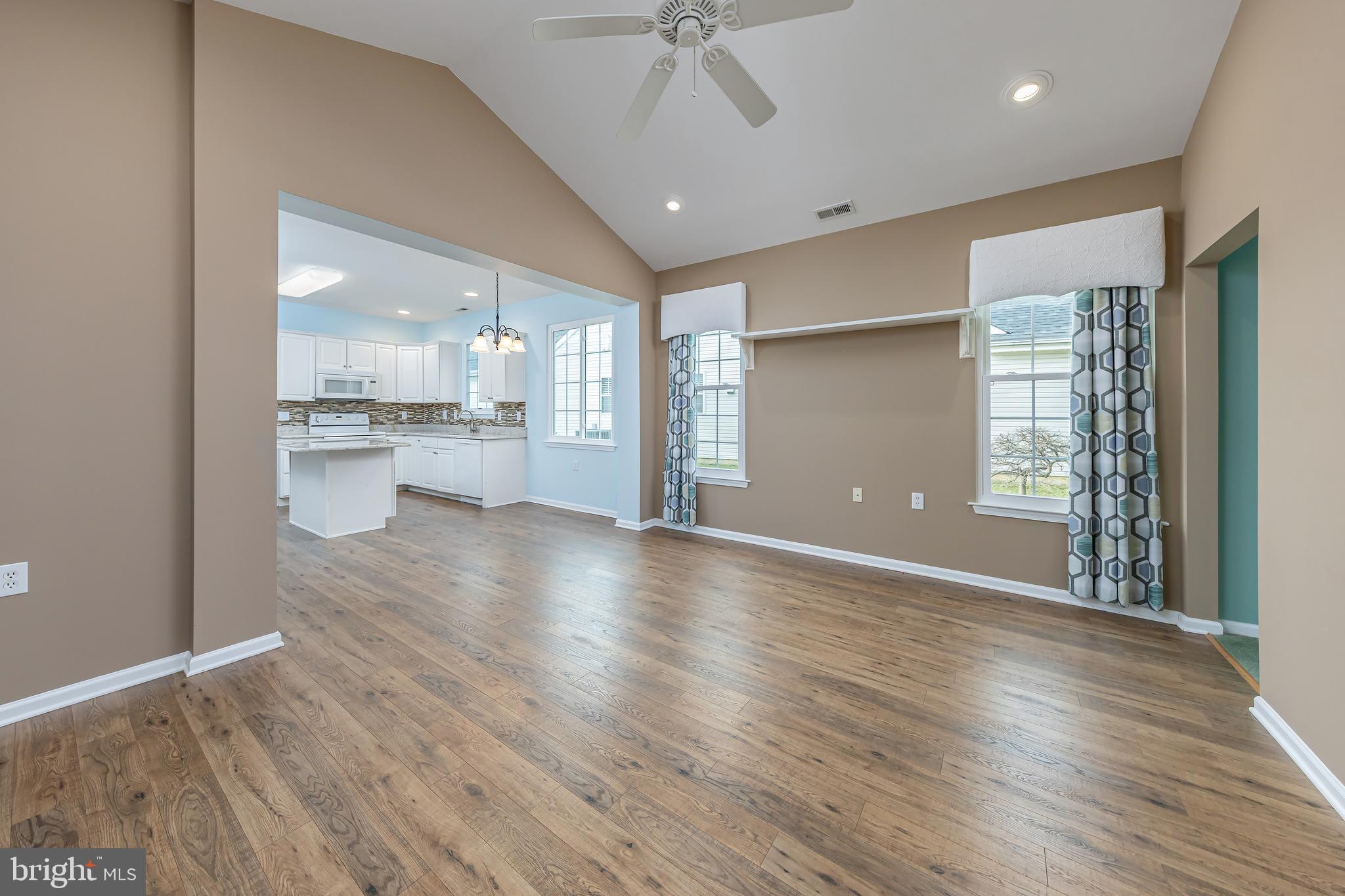 137 Merion Way Hainesport, NJ 08036 - Photo 4 of 26 a view of a kitchen with a sink and wooden floor