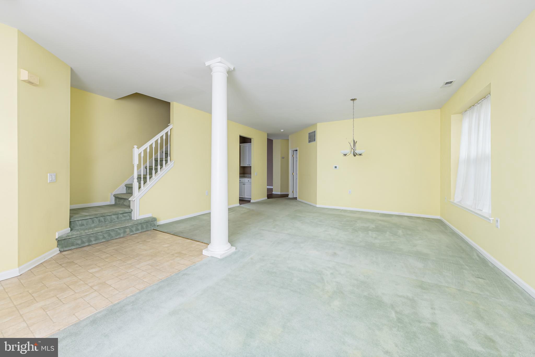 137 Merion Way Hainesport, NJ 08036 - Photo 10 of 26 a view of an empty room with stairs