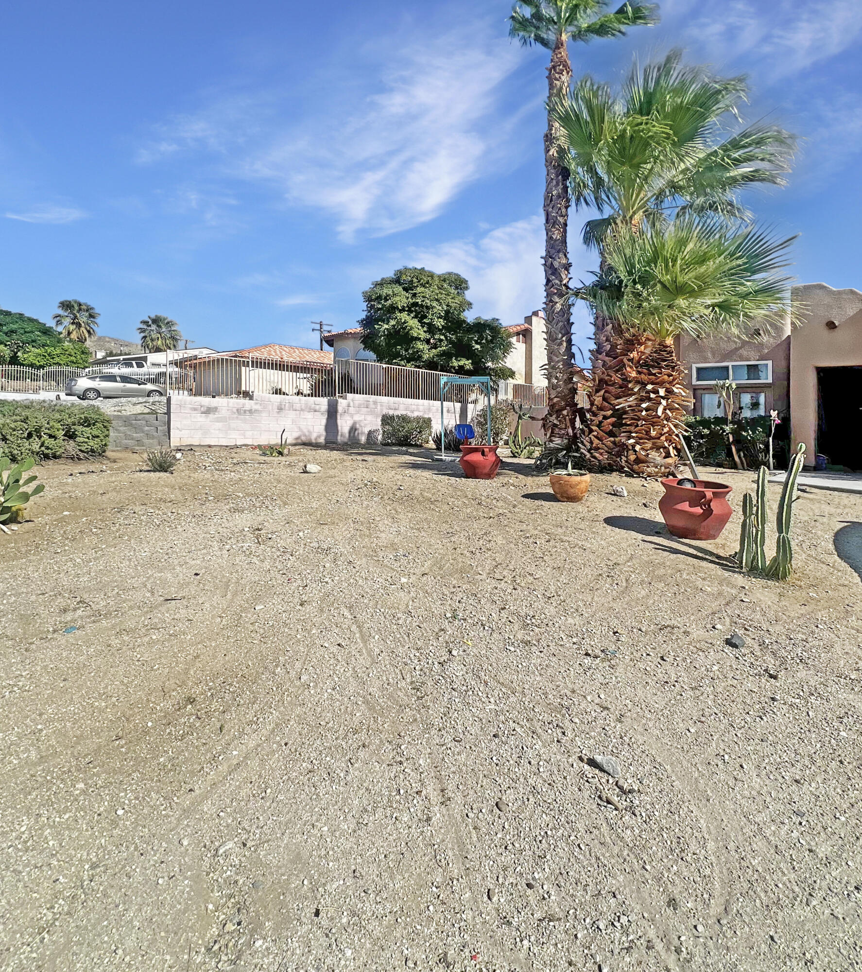 12928 Agua Cayendo Road Desert Hot Springs, CA 92240 - Photo 13 of 21 front view of a house with a outdoor space
