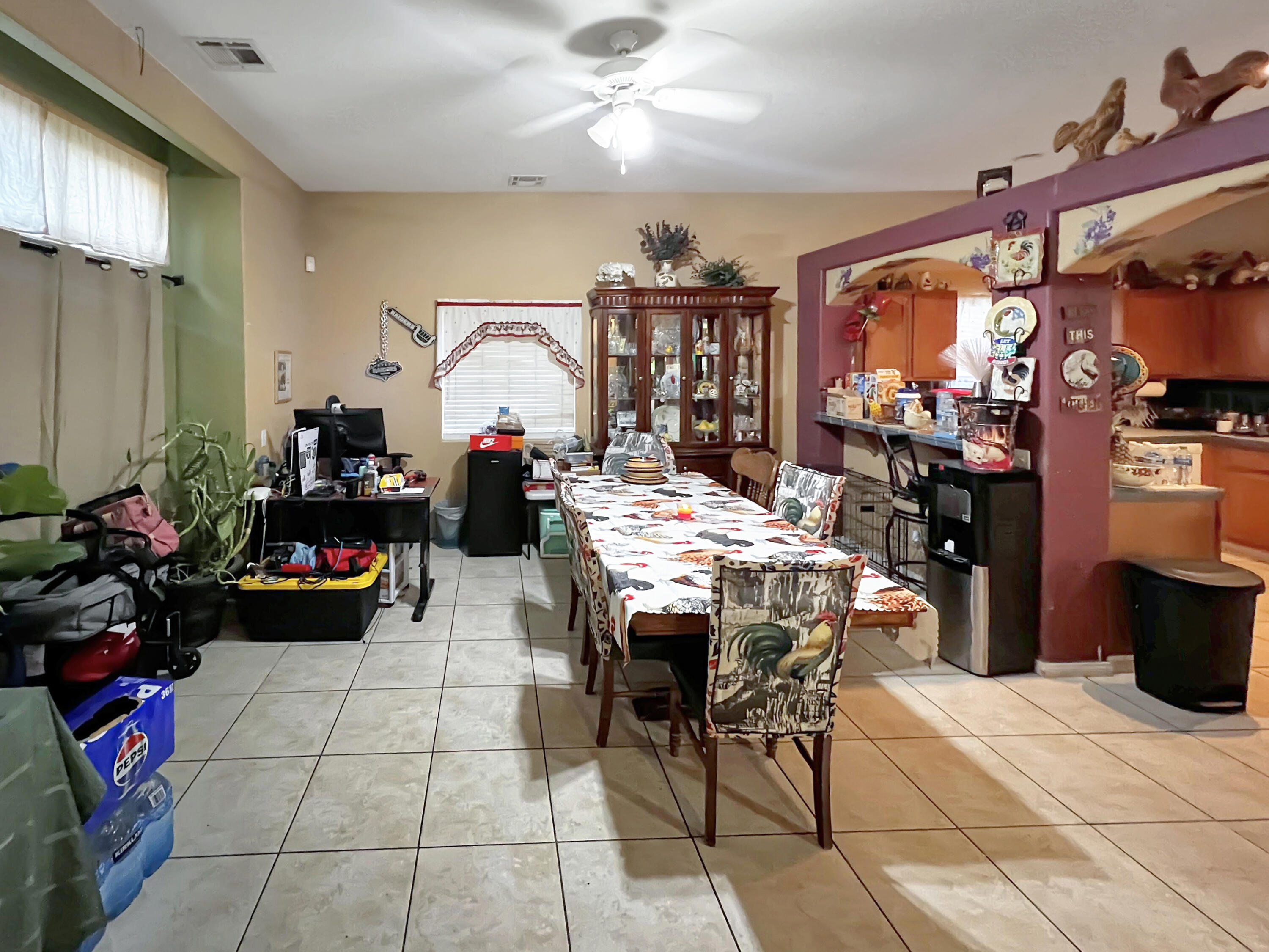 12928 Agua Cayendo Road Desert Hot Springs, CA 92240 - Photo 3 of 21 a view of a dining area with furniture