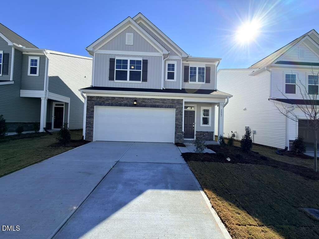 2007 English Saddle Lane Durham, NC 27703 - Photo 2 of 45 a front view of a house with a yard