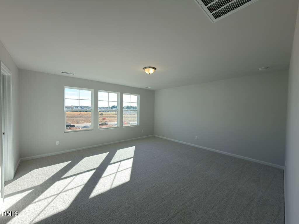2007 English Saddle Lane Durham, NC 27703 - Photo 25 of 45 an empty room with windows