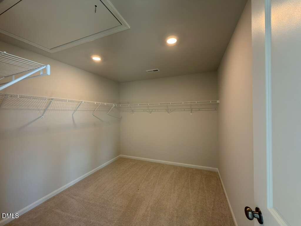 2007 English Saddle Lane Durham, NC 27703 - Photo 29 of 45 a view of a room with racks on the wall